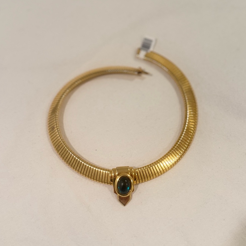 Elegant Gold Necklace with Black Stone